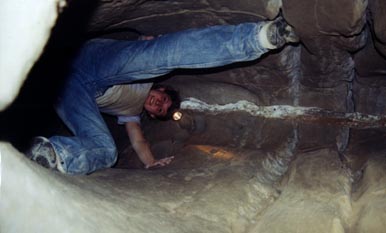 Nutty Putty Cave: Chantal climbs down inside the aorta.